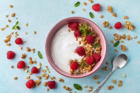 bowl-with-greek-yogurt-raspberries-and-granola-ibs-concept